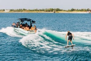 Supra Sl with wake foiler behind the boat